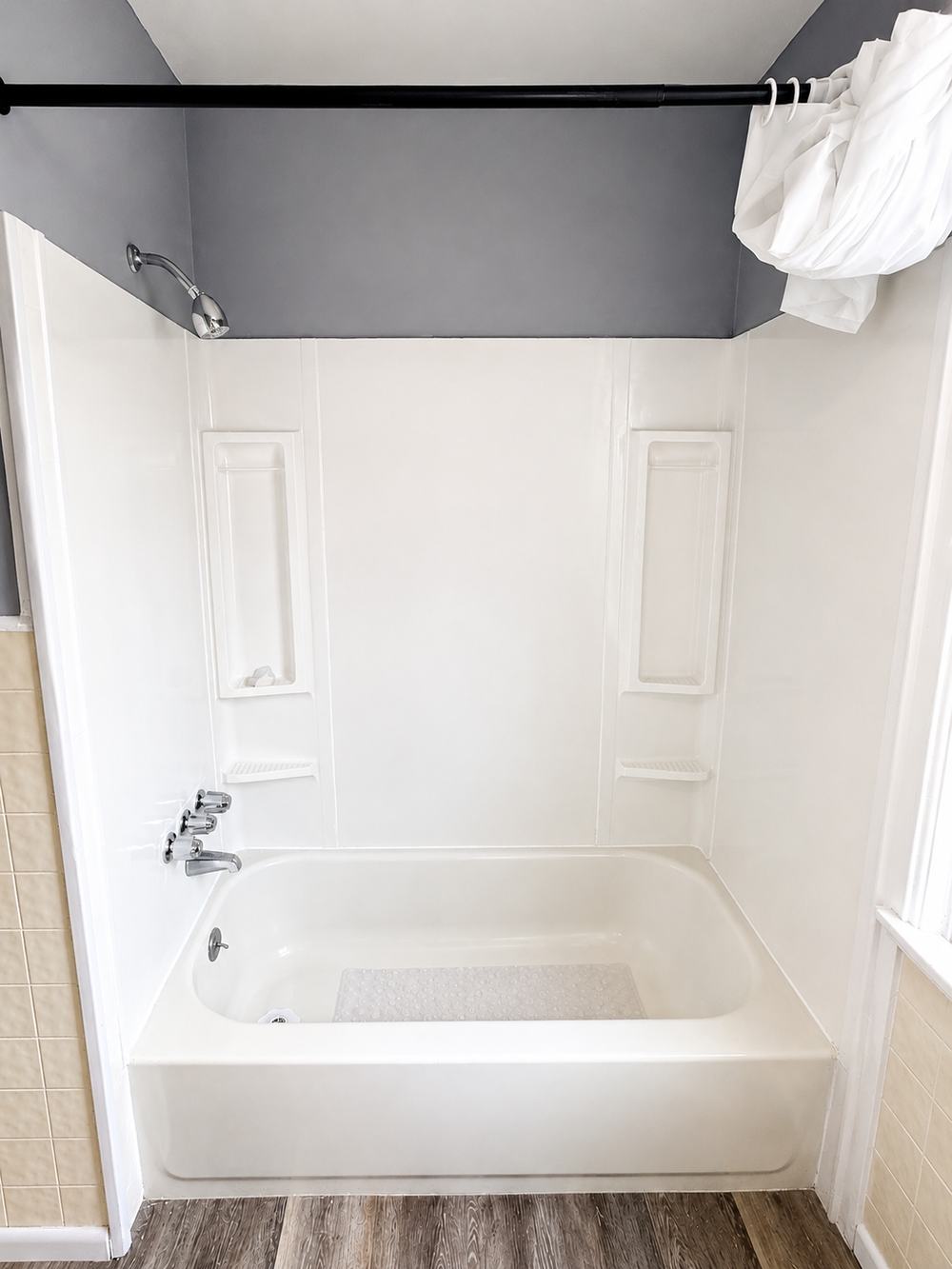 Tub surround after - bright white seamless finish
